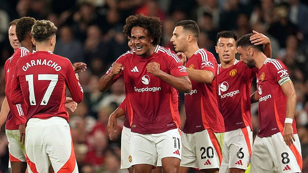 | Photo: Martin Rickett/PA via AP : Burnley  Vs Manchester United Live Score, Premier League 2025-26: Players in action.